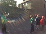 Children at Talley school viewing the eclipse.