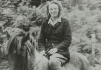 Peggy Jones Riding a Horse