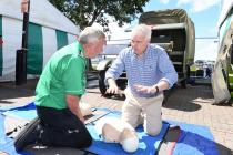 First Minister Carwyn Jones learning CPR with...