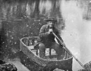 Ioan Glan Lledr in his coracle, c. 1880