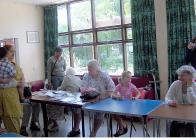 Anne Walker, with volunteers at Tuesday Lunch Club