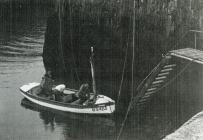 Men working on the boat