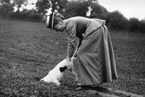 Llangibby House party, woman with dog, 1902