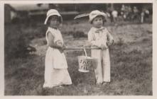 Two children at Rhayader Carnival, late 1930s