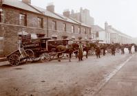 Row of the firm's horse-drawn bread vans....