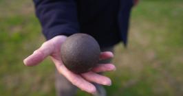 Close-up of a cannon ball fired in 1779 from...