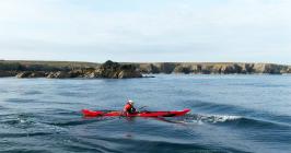 Eila Wilkinson in her sea kayak near Porth...