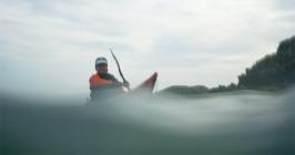 Eila Wikinson at Porth Dafarch in her sea kayak.