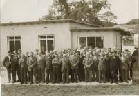 Group photo of local men (farmers?) from the...