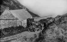 Motor cars parked at Martin's Haven, date...