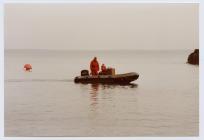 Two people in a rib, Skomer Island, March 1994