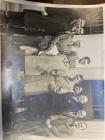 Ten men standing in front of the Temple's...