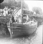 Men and boat at Trefriw Quay
