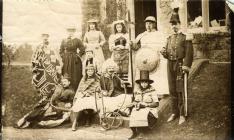 Group of young people in fancy dress [?for a...