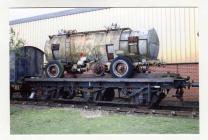 Disused and dilapidated railway milk tanker on...