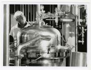 Man operating machinery in Felin Fach Creamery