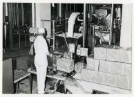 Man working with machinery, Felin-Fach Creamery