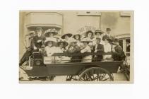 Postcard image of a charabanc / horse carriage...