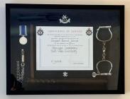 FRAMED COLLECTION OF POLICE MEMORABILIA