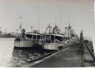 HMS Encounter H10 alongside HMS Express H61